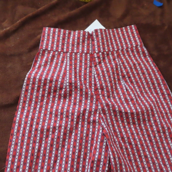 Never A Wallflower Women's rust Beetle stripe Print Flare Pants Size XS NWT $264 - Picture 4 of 8